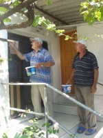 Caminin bakımını ve tamirlerini yapan Ahmet Gürses ve aza Behsat Selvi.27.07.2014